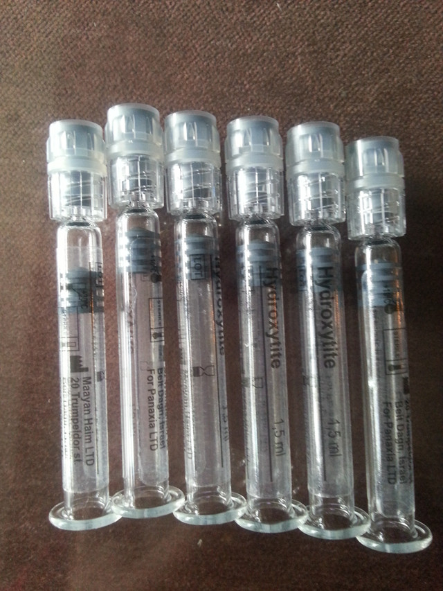 labelled syringe samples by Horizontal syringe labeling mach