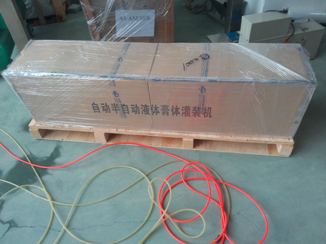 wooden pallet packaging for spout pouches filling machine.jp