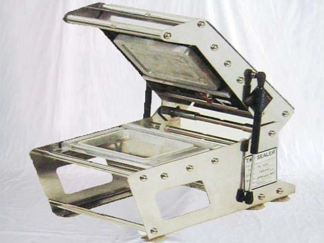 Canadian customer orders tray sealing machine semi automatic tabletop manual boxes sealer