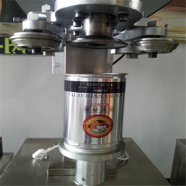 operation of  Can sealing closing machine beer tin cans seal