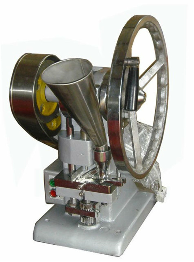 up-close view of single-punch tablet press.jpg