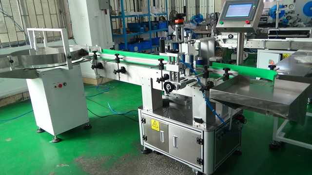 Labeling machines automatic and semi automatic bottle container labeler equipment label applicators