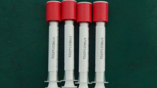 labeled syringes by Syringe labeling machine semi automatic 