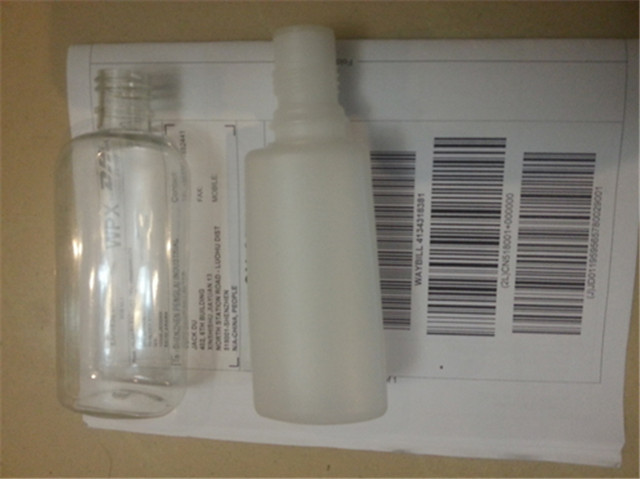 bottle and label samples received from customer.jpg