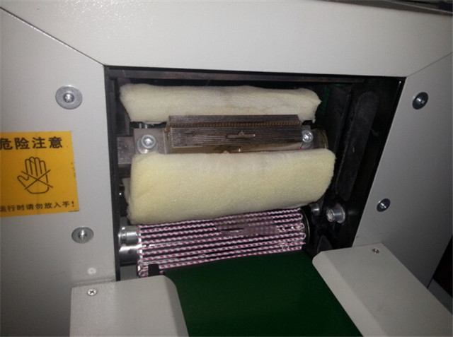 outlet of flow wrapping machine.jpg