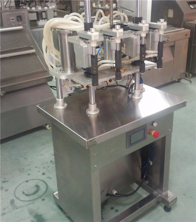 side view of YX-V04 vacuum liquid filling machine.jpg