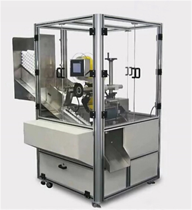 whole view of  the automatic tubes labeling machine with mat
